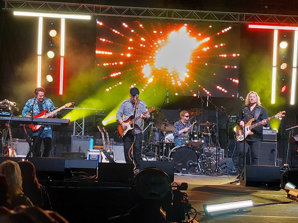 Eagles cover band on main stage at Yuma car show