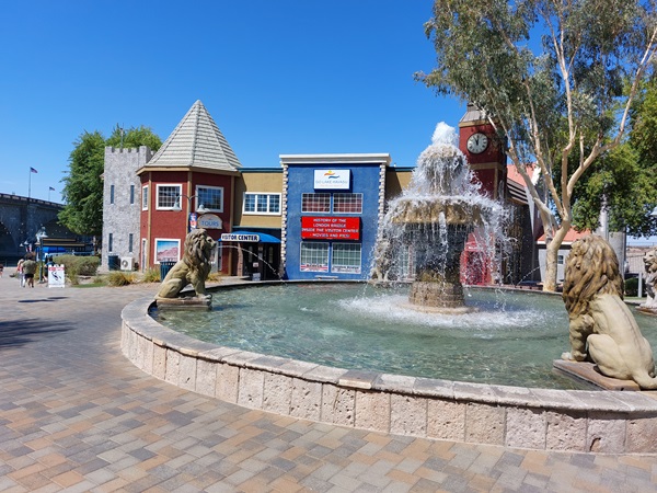 View of the English Village fountain and visitor center.